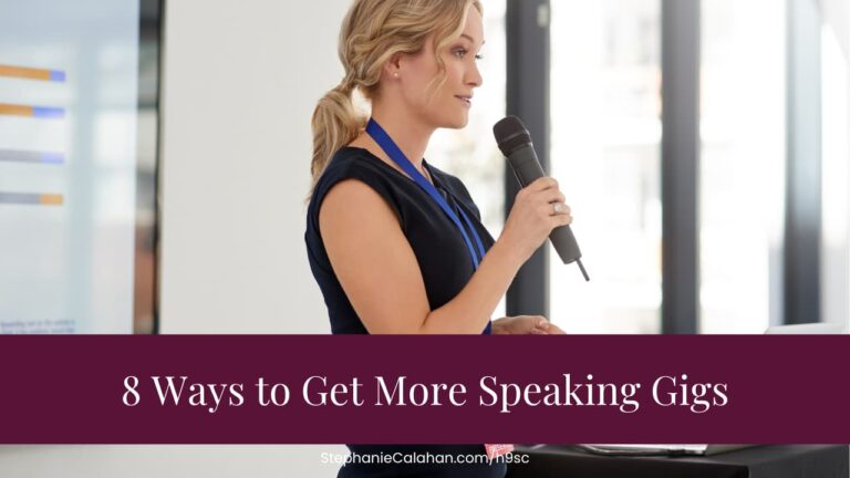 8 Ways to Get More Speaking Gigs - Woman with long blond hair tied back standing with a microphone speaking to an audience