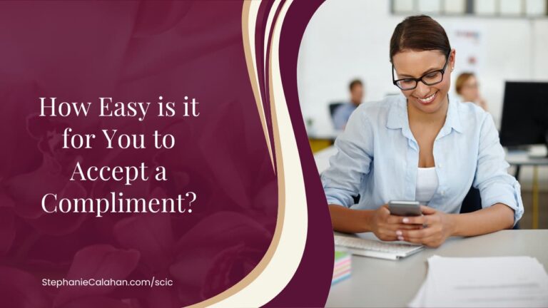 How well can you accept a complement? woman with dark hair and glasses smiling while looking at her phone